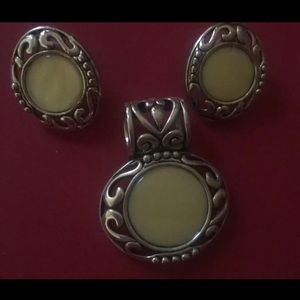 Matching set. Pendant, Earrings and bracelet in good condition.